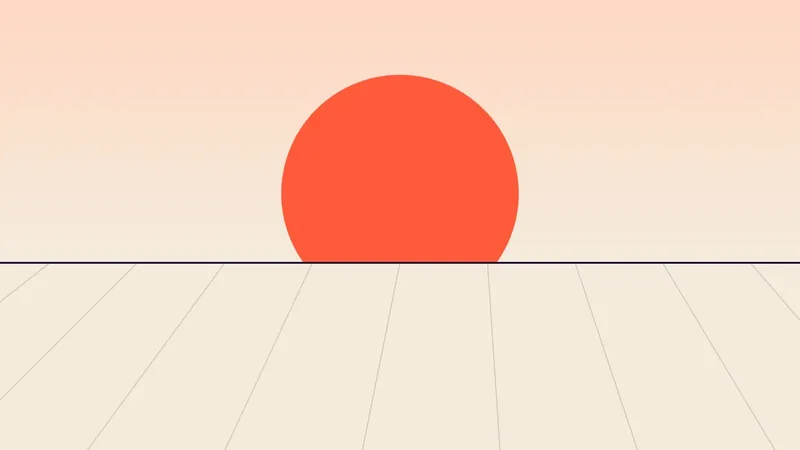 An orange sun sinking behind white bands of salt pans at dawn.